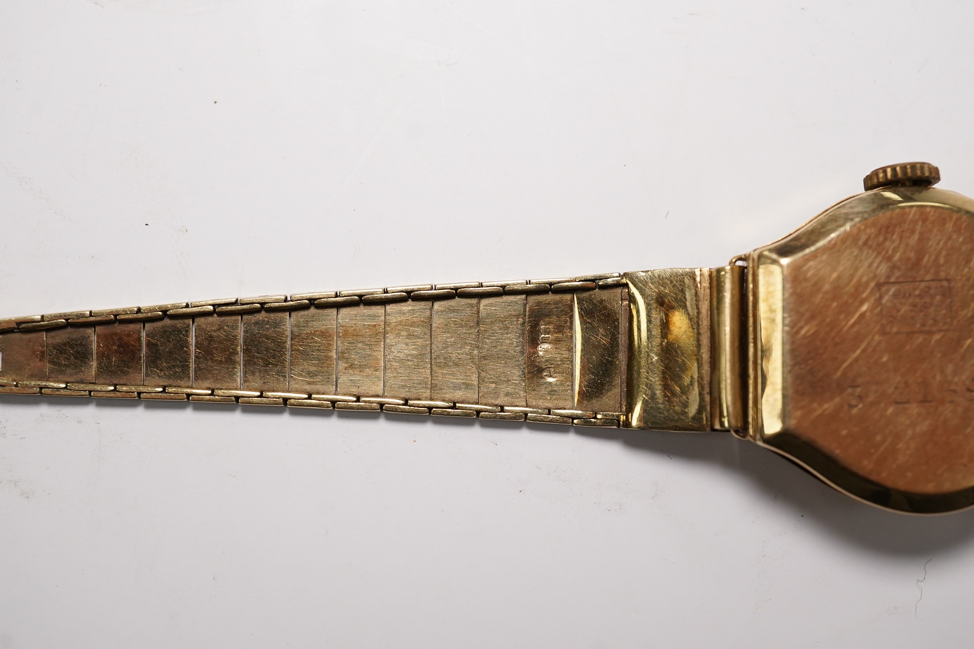 A lady's 14k manual wind wrist watch, on a 14k bracelet, gross weight 14 grams. Condition - poor to fair